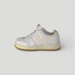 This is a pair of used Nike Air Force 1 low-top